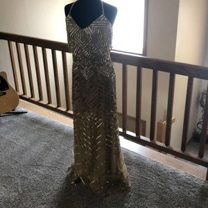 Gold sequin dress.